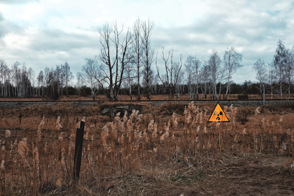 Barren wasteland, with radioactive sign